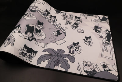 Bobtail - A Relaxing Day By The Pool Deskmat